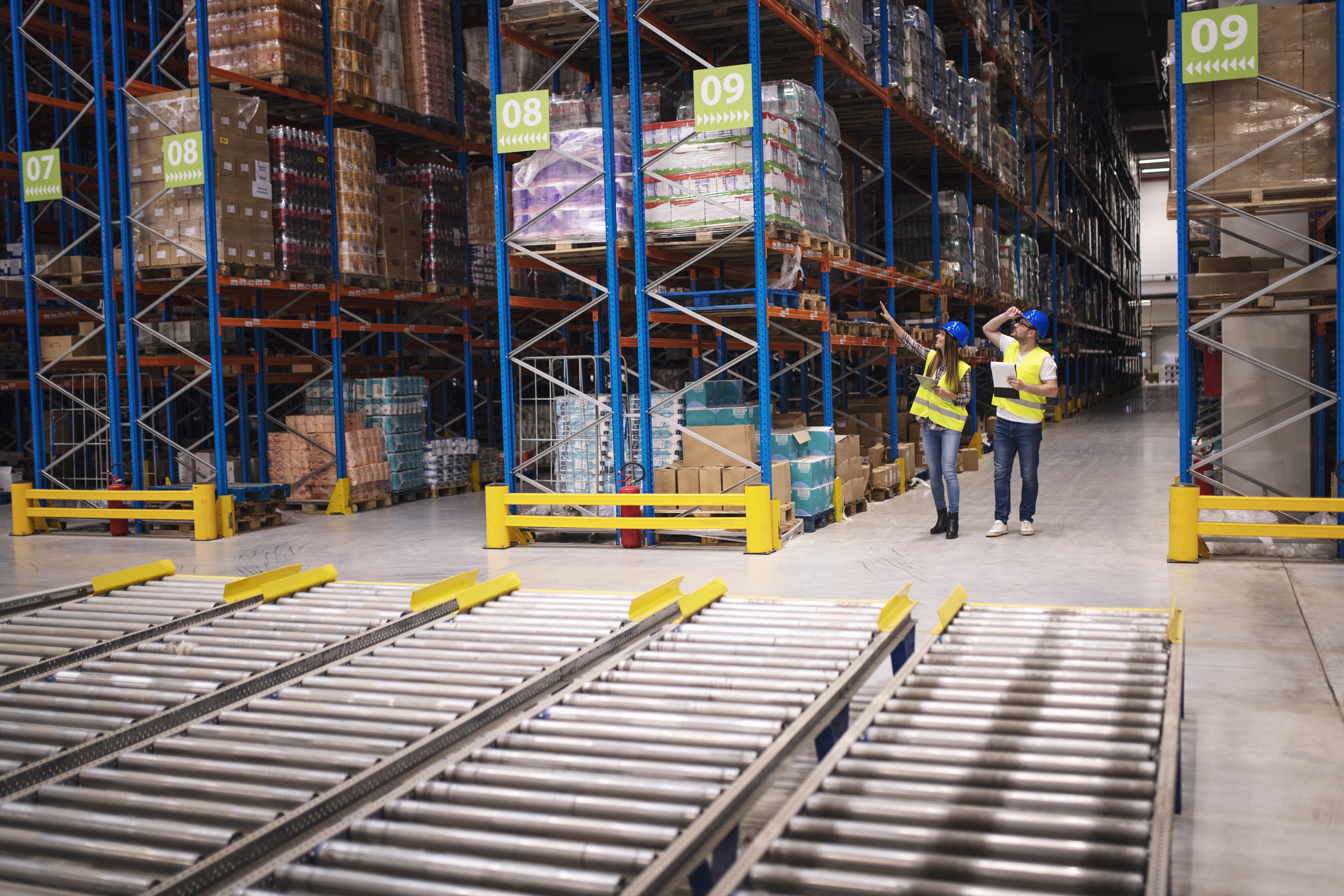 Warehouse shelves stacked with boxes and pallets